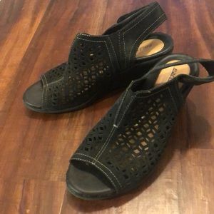 Black wedge sandals.